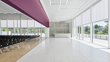 Foto Kulturhalle mit Bestuhlung und Sichtbeton